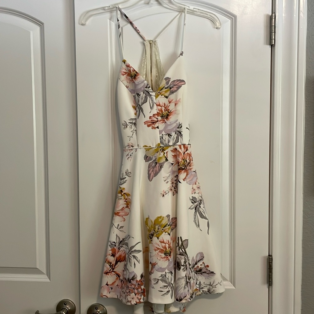 White and pastel floral patterned dress